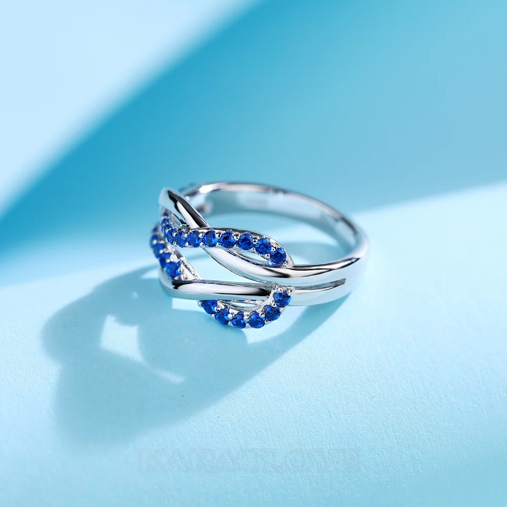 Round Cut Sapphire Blue Sterling Silver Intertwined Band Promise Ring